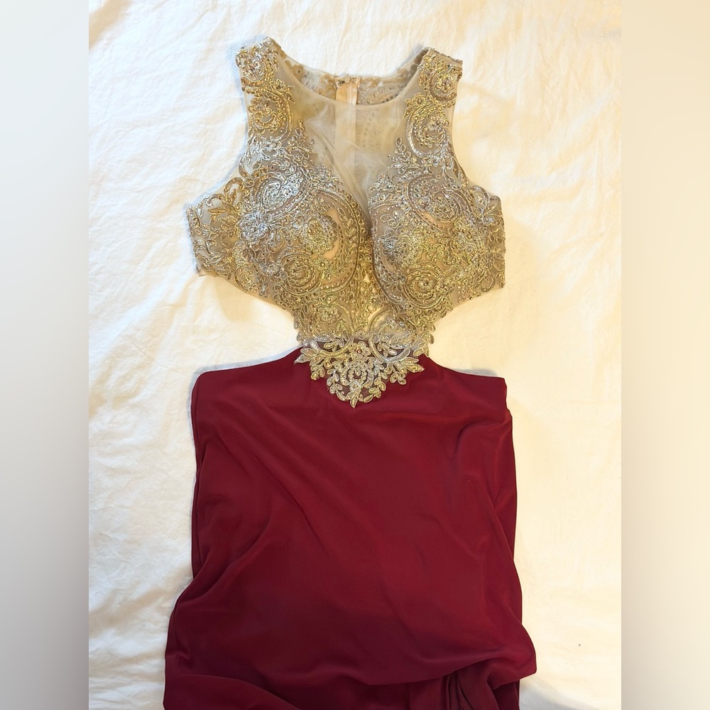 Gold and maroon backless dress with high slit